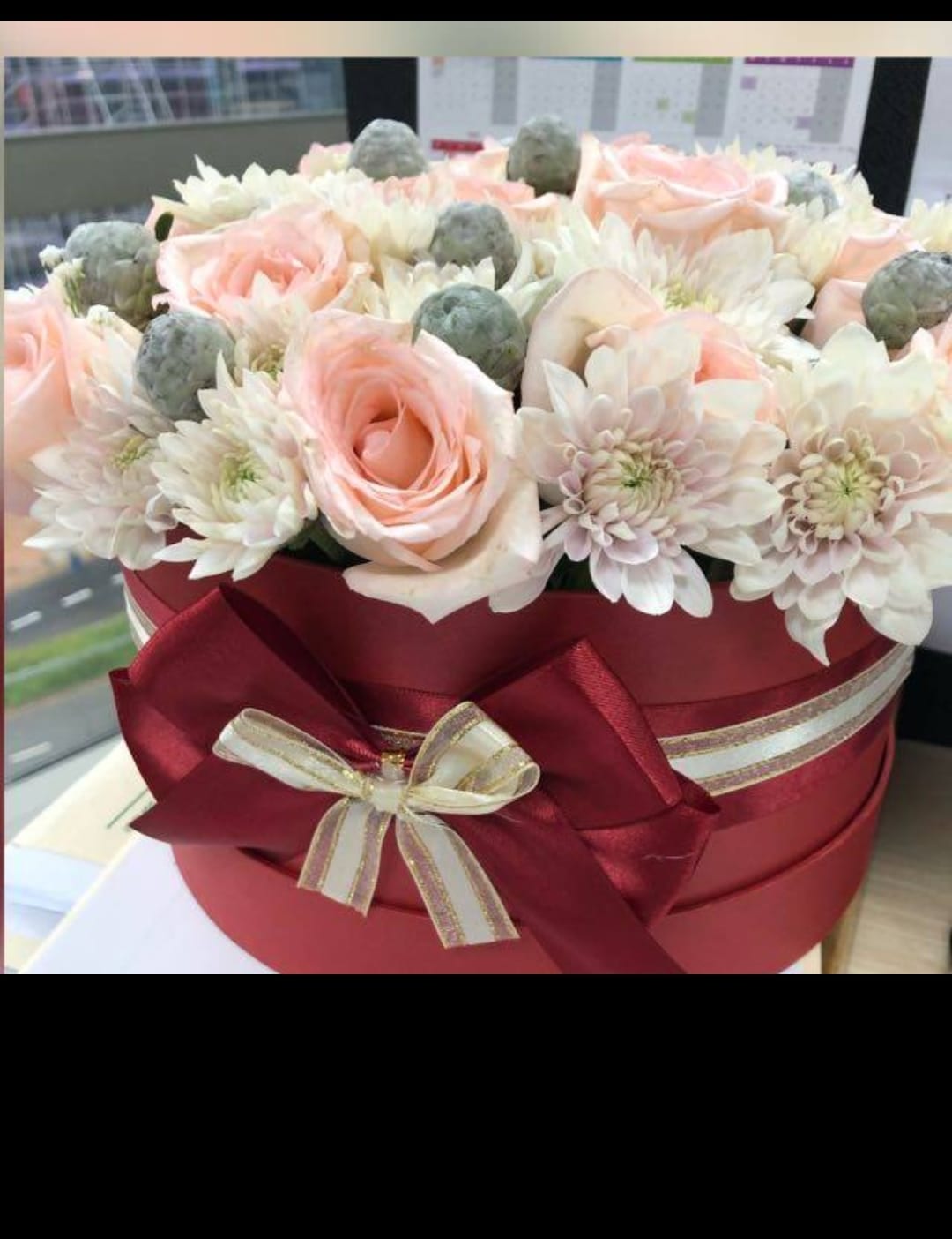 Pink roses in a gift box by Flowers by Desire